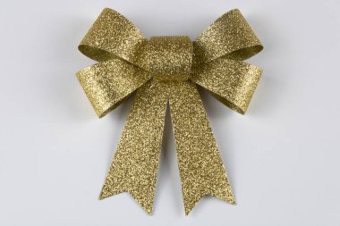 Beyaz arka planda altın parıltı var. Noel nesnesi