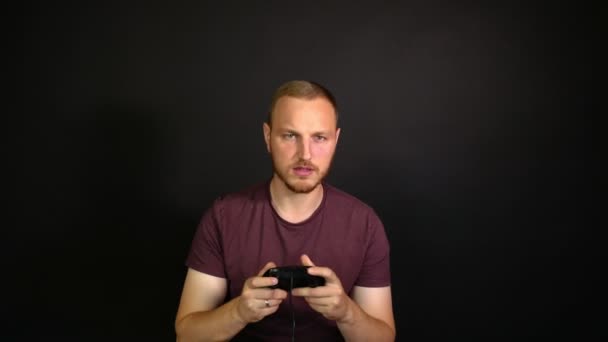 Focused Bearded Man Plays Console Loses Throws Gamepad — Stock Video