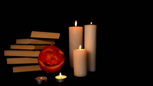 Calabaza Tallada Concepto Libros Velas Halloween — Vídeos de Stock