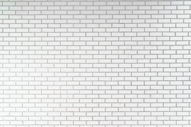 Bir arka plan closeup olarak beyaz ince tuğla duvar