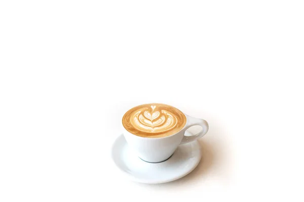 Uma xícara de latte ou capuchino em uma xícara branca na superfície branca — Fotografia de Stock