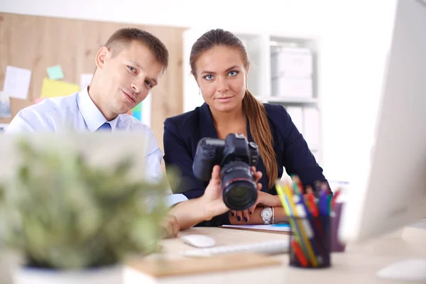 Young woman working in office, sitting at desk. Young woman. Partners — Stock Photo, Image