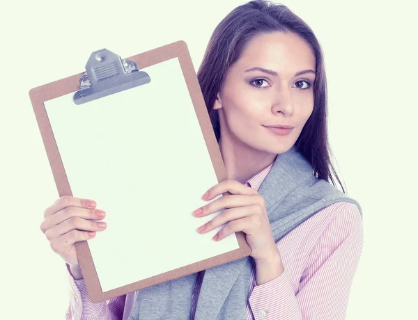 Mujer mostrando una página en blanco del portapapeles —  Fotos de Stock