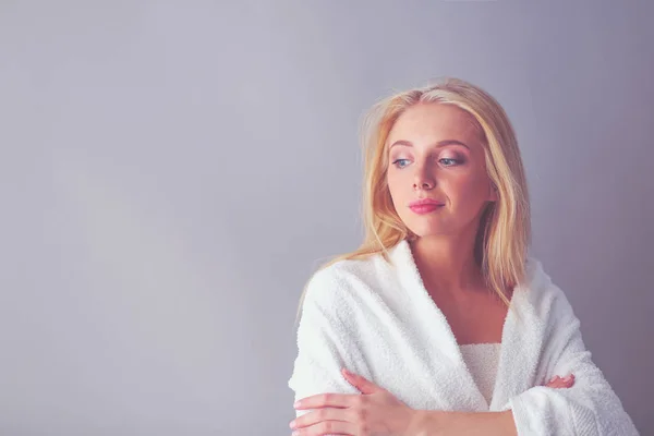 A beautiful woman, portrait isolated on blue background. A beautiful woman. — Stock Photo, Image