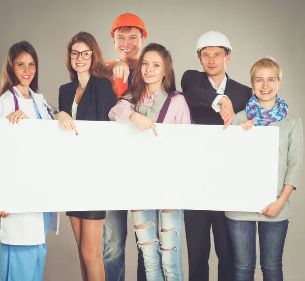 Ritratto di persone sorridenti con varie occupazioni con cartellone in bianco — Foto Stock