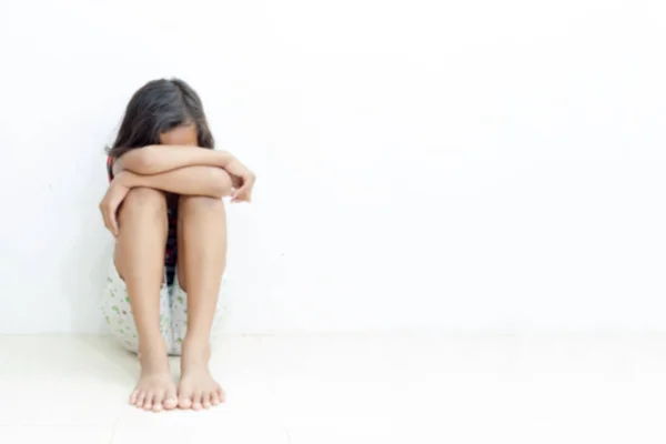 Blurry Unhappy Child Sitting On Floor At Home — Stok Foto