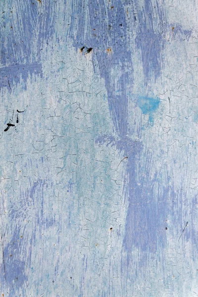 Parede pintada velha com branco, rachaduras de tinta azul e textura — Fotografia de Stock