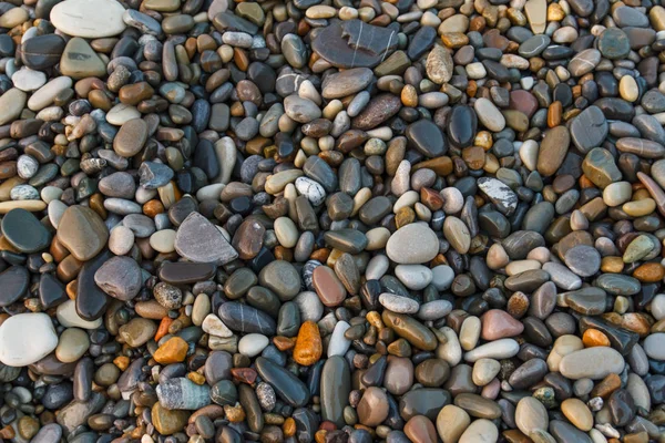 Abstraktní pozadí s kameny. Oblázky, pobřeží. Abstraktní pozadí s kameny. — Stock fotografie