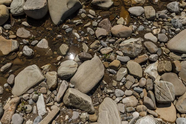 Taşlar ile soyut arka plan. Çakıl taşları, sahil. Taşlar ile soyut arka plan.