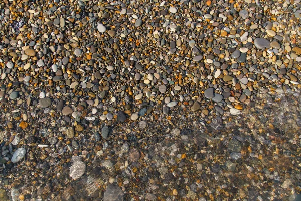 Fundo abstrato com pedras. Pedrinhas, costa. Fundo abstrato com pedras . — Fotografia de Stock