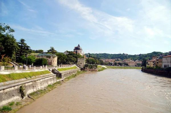 view of the roman catholic church of San Giorgio in Braida. from the Garibaldi Bridge. church dating to the 16th century, offering views across the adige river. Verona,UNESCO world heritage site,italy