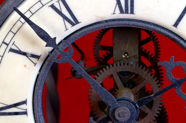 old metal dusty mechanical clock with moving gears and screws. Brass cog wheels, Close view of old rusty clock mechanism with gears and cogs. Element of design. pendulum clock