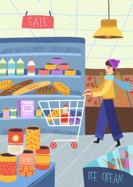 Bakkal alışverişi yapan adam bir süpermarkette yiyecek le bir sepeti iterek