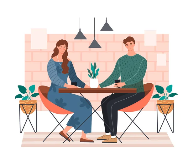 Jovem casal desfrutando de um encontro em um café —  Vetores de Stock
