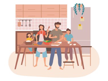 Genç bir aile mutfakta birlikte yemek hazırlıyor.
