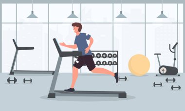 Genç ve formda bir adam spor salonunda koşu bandında koşuyor.
