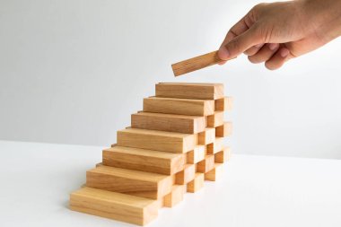 Mimari model, Planlama Alternatif Risk ve İş Stratejisi kavramı ile El tutma Ahşap blok