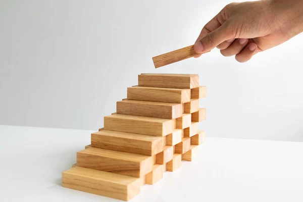 Mimari model, Planlama Alternatif Risk ve İş Stratejisi kavramı ile El tutma Ahşap blok