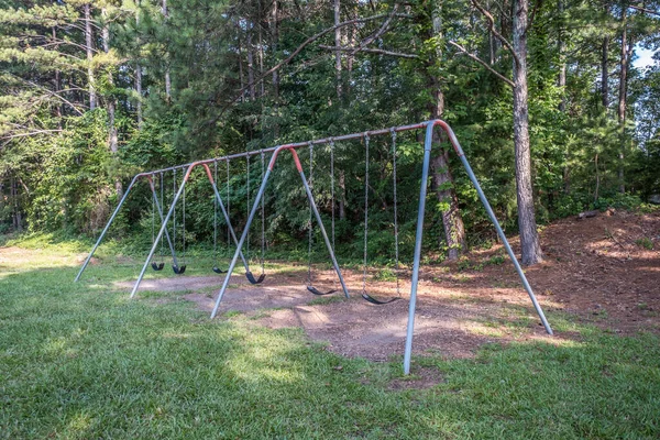 Worn Used Swing Set Sits Abandoned Park Metal Frame Chains — Stock Photo, Image