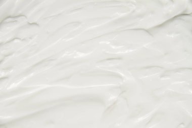 Kozmetik. Krem beyaz arkaplan dokusu.