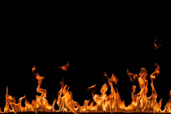 Llamas de fuego sobre fondo negro. — Foto de Stock