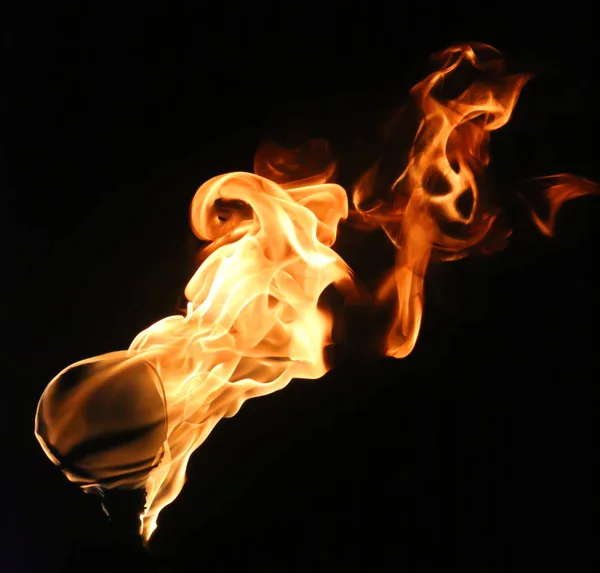 Fire flame isolated on black background — Stock Photo, Image