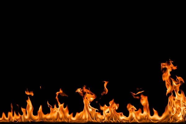 Llamas de fuego sobre fondo negro. — Foto de Stock