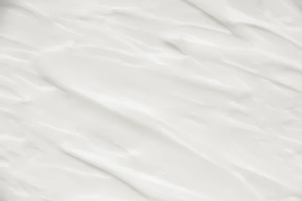 Cosméticos. Creme textura fundo branco. — Fotografia de Stock