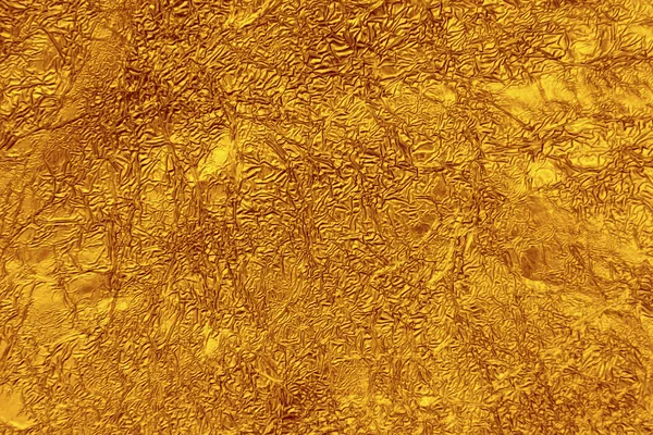 Zerknüllte Goldfolie Textur Hintergrund — Stockfoto