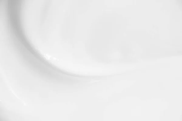Αφηρημένο λευκό κυματιστή κρέμα φόντου θολή. — Φωτογραφία Αρχείου