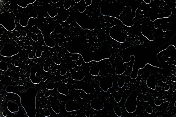 The concept of water drops on a black background. — Stock Photo, Image