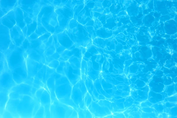 Blue color water in swimming pool rippled water detail backgroun — Stock Photo, Image