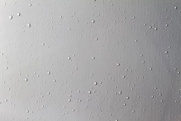 Drops of water on a color background. Gray — Stock Photo, Image