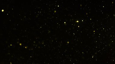 Siyah arkaplan ile soyut altın bokeh