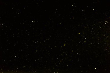 Siyah arkaplan ile soyut altın bokeh