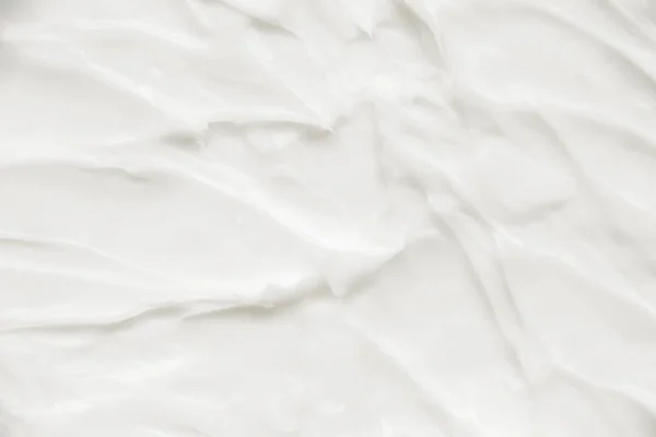 Cosmétiques. Texture de fond blanc crème. — Photo