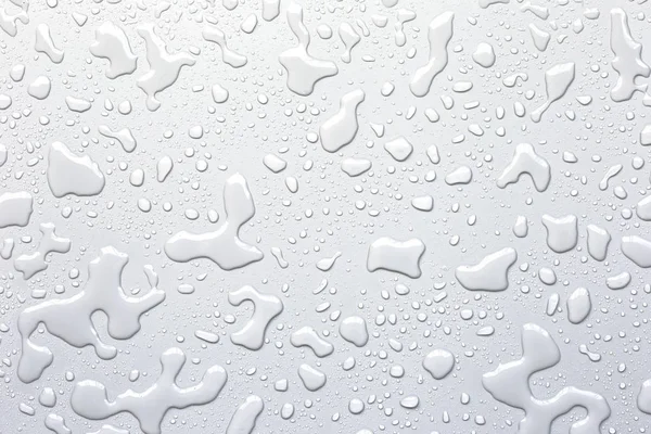 Water droplets on a gray background — Stock Photo, Image