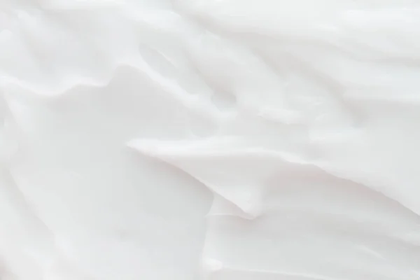 Cosméticos. Textura de fondo blanco crema. — Foto de Stock