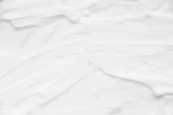 Cosméticos. Textura de fondo blanco crema. —  Fotos de Stock