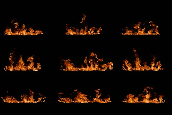 Vuur vlammen op zwarte achtergrond. — Stockfoto