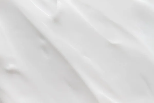 Cosméticos. Textura de fondo blanco crema. — Foto de Stock