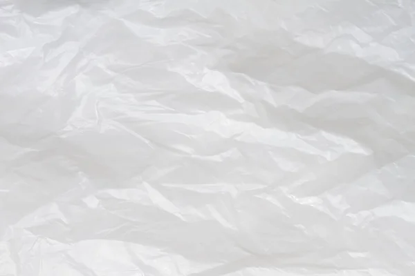 Текстура белого пластикового мешка, макро-, фон — стоковое фото