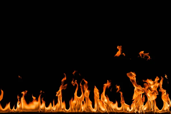 Llamas de fuego sobre fondo negro. — Foto de Stock