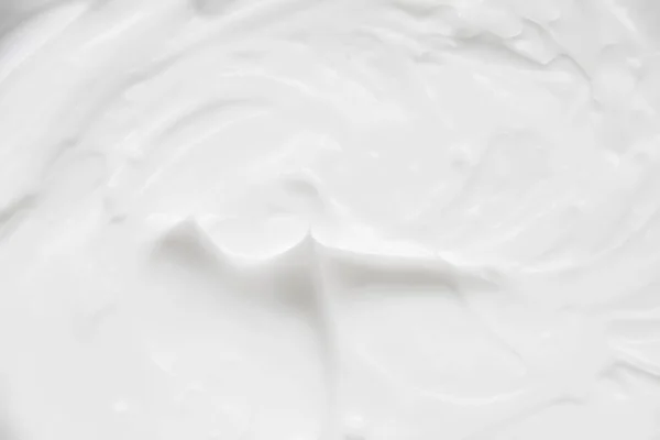 Cosmétiques. Texture de fond blanc crème. — Photo