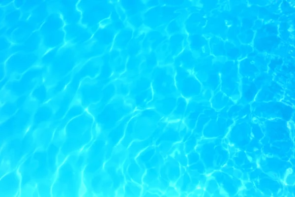 Blue color water in swimming pool rippled water detail backgroun — Stock Photo, Image
