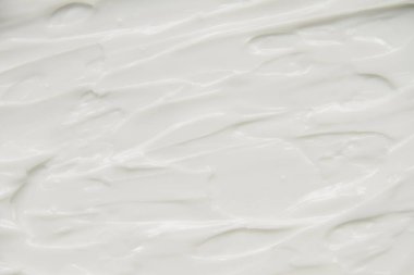 Kozmetik. Krem beyaz arkaplan dokusu.