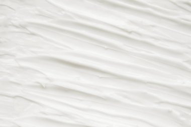 Kozmetik. Krem beyaz arkaplan dokusu.