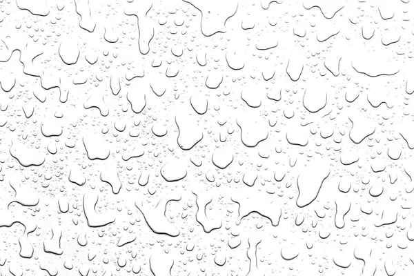 O conceito de gotas de água sobre um fundo branco — Fotografia de Stock