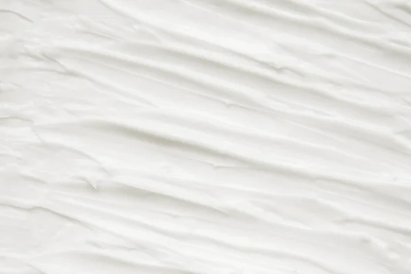 Cosméticos. Textura de fondo blanco crema. —  Fotos de Stock