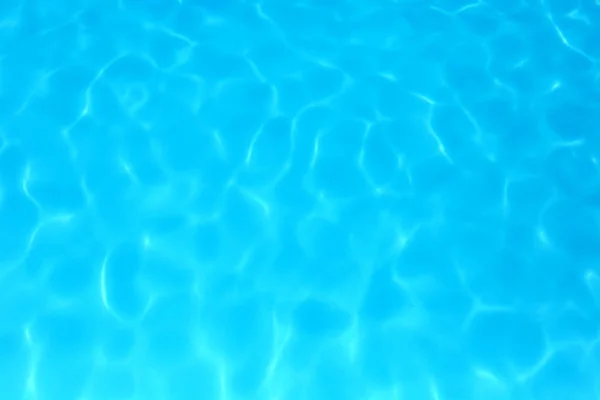 Água de cor azul na piscina ondulado detalhes da água backgroun — Fotografia de Stock